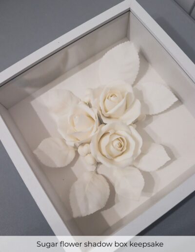 Handcrafted sugar flower shadow box keepsake created from a bespoke wedding cake for a Whitley Hall Sheffield wedding